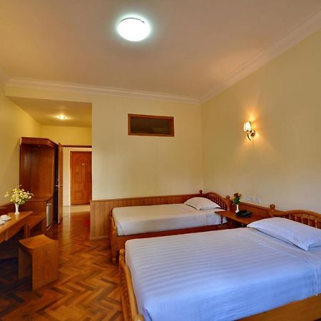 Win Unity Hotel Мемьо Экстерьер фото