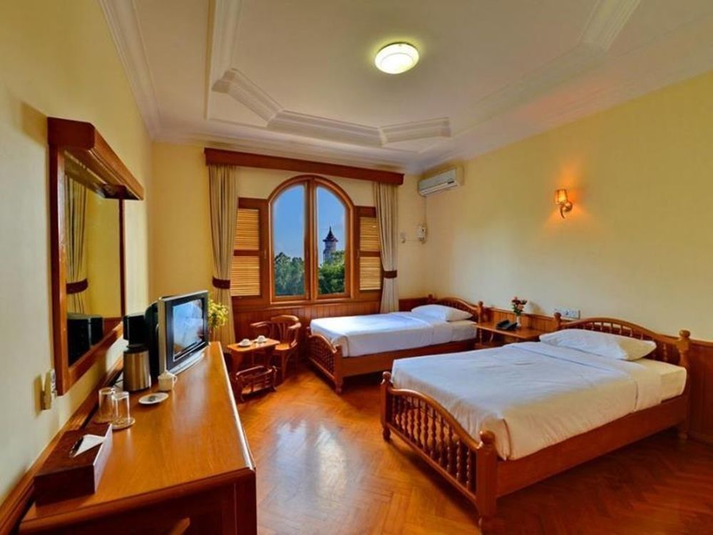 Win Unity Hotel Мемьо Экстерьер фото